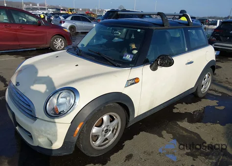 2011 Mini Cooper z USA, uszkodzony, nr VIN WMWSU3C56BT097967